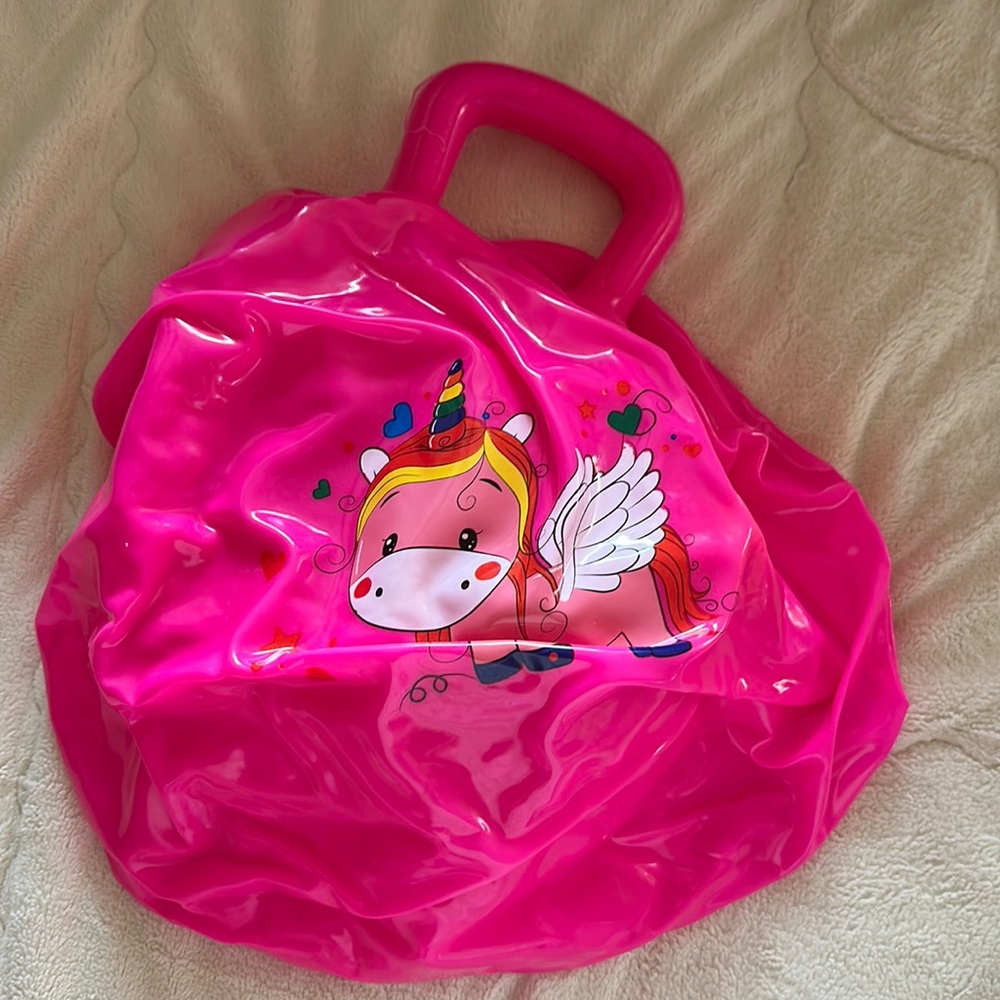 Pink unicorn hoppity ball inflatable bouncer toy with handle